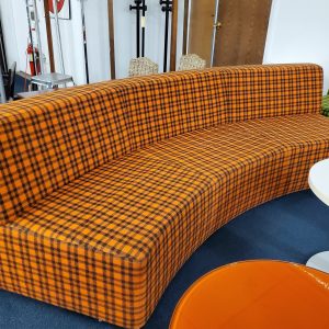 Curved sofa by Davis, Brown and Orange plaid - Image 1