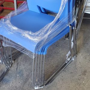 Blue Stack chairs with chrome sled base - Image 1