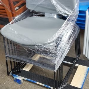 Grey sled base stack chairs